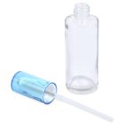 A 50mL glass cylinder round bottle with its blue pump dispenser removed and placed next to it. The pump has a long transparent tube attached. The brand name "COMPAX" is visible in the bottom-left corner.