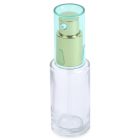 A 28mL Glass Cylinder Round Bottle, featuring a green and gold spray nozzle and topped with a translucent green cap, is shown against a white background. The word "COMPAX" is visible in gray text towards the bottom left corner of the image.
