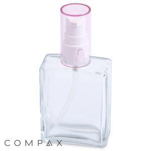 A clear 60mL glass oblong spray bottle featuring a white spray nozzle and a transparent pink cap. The bottle is empty, with the brand name "COMPAX" displayed at the bottom left corner.