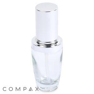 A clear 30mL glass fluted round bottle with a silver screw-on cap, commonly used for cosmetics or skincare products. The bottle features the brand name "COMPAX" at the bottom.
