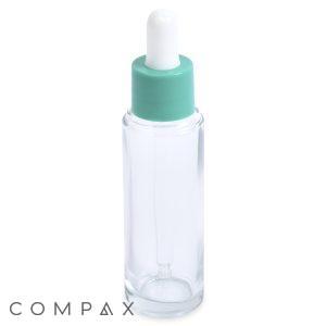 A 30mL Glass Cylinder Round Bottle with a green cap and white dropper tip placed on a white background. The word "COMPAX" is written in light gray at the bottom left corner.
