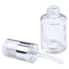 A 30mL Glass Cylinder Round Bottle lies open with the cap and pump laying next to it. The cap is silver and clear with a visible pump tube. The bottle is cylindrical and transparent. The word "COMPAX" appears at the bottom left corner of the image.