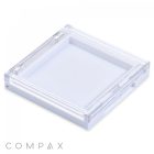 A clear, square, acrylic container with a hinged lid and a white base, photographed on a white background. This Square Single Pan Compact is designed for holding small items, and the word "COMPAX" appears in gray text near the bottom left corner.
