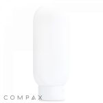 A plain, white, cylindrical plastic bottle with a rounded top and a flat, white cap at the bottom. The word "COMPAX" is printed in small, gray letters in the bottom left corner of the image.