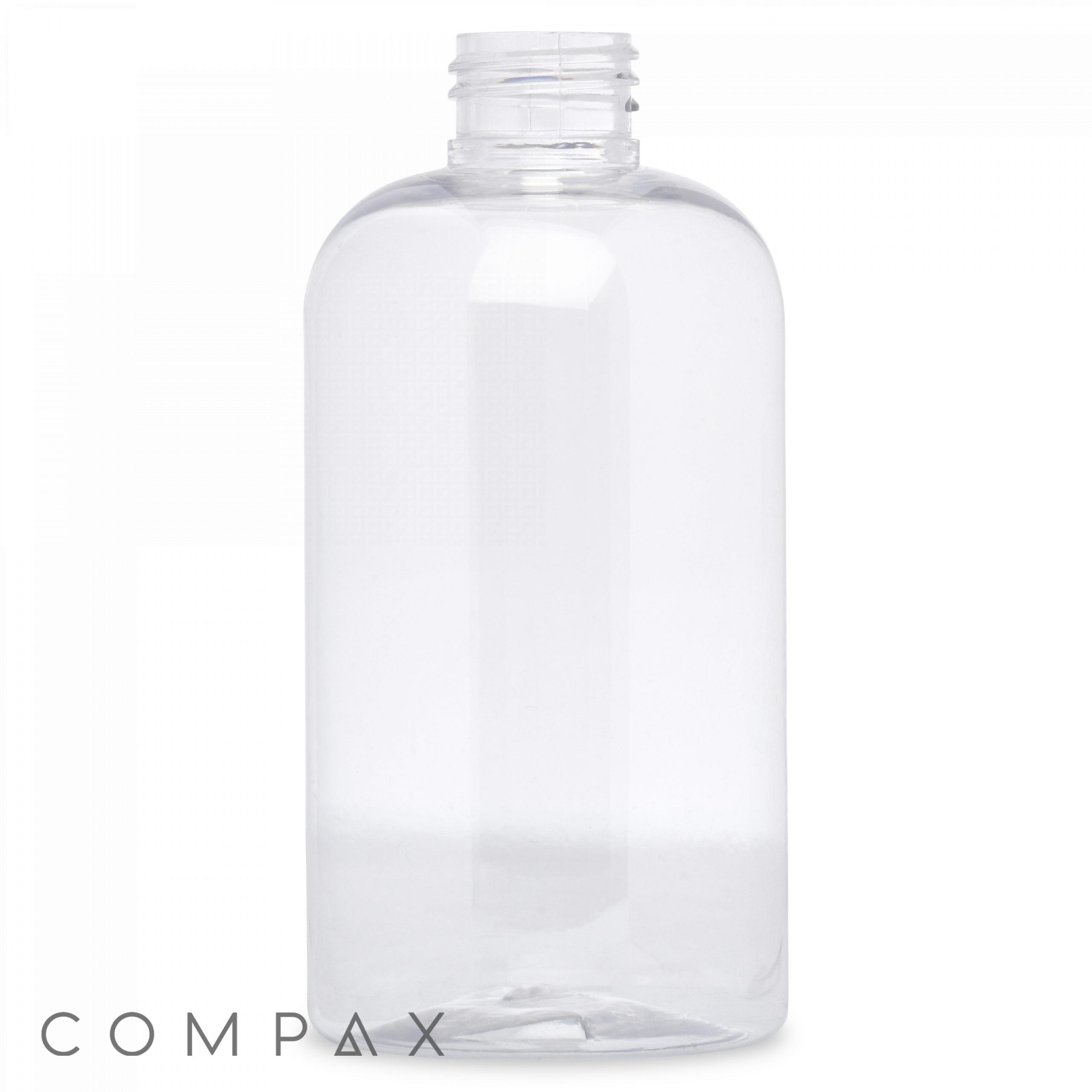 A clear, empty 250mL Boston Round Bottle with a cylindrical shape and a screw-top opening. The bottle is standing upright against a plain white background, and the word "COMPAX" is visible in the bottom left corner.