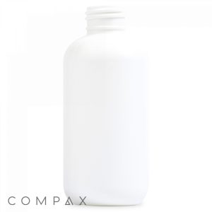 A plain white 4oz Tall Boston Round Bottle with a wide screw-top opening. The bottle has a simple and sleek design, lacking a label or any distinguishing marks. The word "COMPAX" is written in gray lowercase letters at the bottom left of the image.