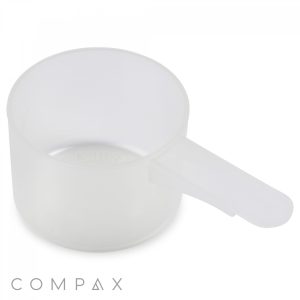A picture features the 48cc Scoop, a transparent plastic measuring scoop with a handle, commonly employed for measuring powdered substances like detergent or protein powder. The brand name "COMPAX" is prominently displayed in the lower-left corner of the image against a white background.