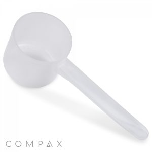 A 60cc Scoop, a transparent plastic measuring tool with a long handle for powders or granular substances, featuring the brand name "COMPAX" in the bottom left corner of the image.
