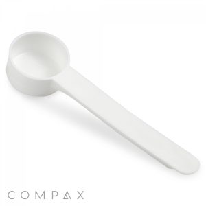 Introducing the 9cc Scoop, a white plastic measuring scoop featuring a long handle that makes it ideal for accurately portioning powdered substances or liquids. Its clean and minimalistic design ensures there are no visible markings or measurements, maintaining its sleek appearance. The "COMPAX" logo is prominently displayed in the corner of the image.