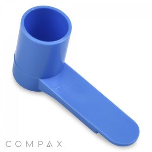 A 3.5cc Scoop in blue plastic featuring the Compax logo in grey at the bottom left corner; it has a cylindrical container on one end and a flat handle on the other.