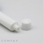 A close-up image of a white, plastic squeeze tube positioned on its side with its cap removed and lying next to it. The tube has a threaded neck and the cap appears to have a flat top. The background is plain and white. The text "13mm Screw Top" can be seen at the bottom.