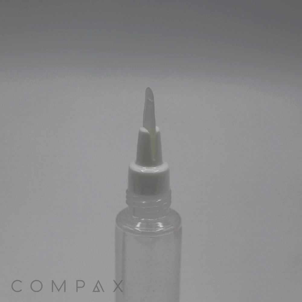 A 19mm Silicone Brush Applicator with a narrow, pointed tip is centered against a solid, light gray background. The word "COMPAX" is faintly visible in the bottom left corner of the image.