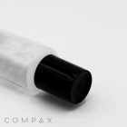 A close-up image of a white bottle with a black cap, likely a cosmetic or skincare product. The words "25mm Needle Nose" are faintly visible in the bottom left corner against the plain white background.