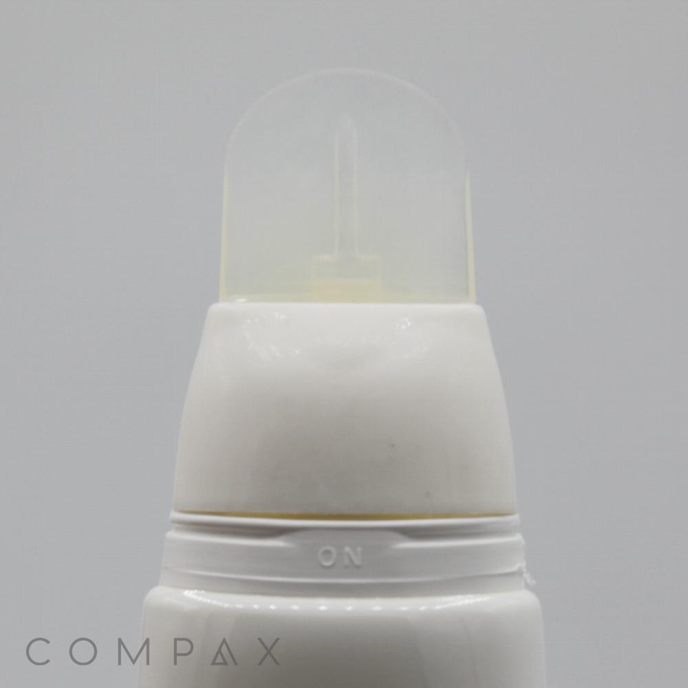A close-up image of a white spray bottle with a transparent plastic cap, featuring an "ON" marking near the top. The background is plain light gray, and the word "COMPAX" is faintly visible in the bottom left corner. The product is identified as the 30mm Oval Silicone Brush Twist.
