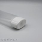 Close-up of a clear plastic tube with a white cap, positioned on a minimalist white surface. The cap is prominent in the foreground, while the product name "50mm Oval Screw Top" appears faintly in the background at the bottom left corner.