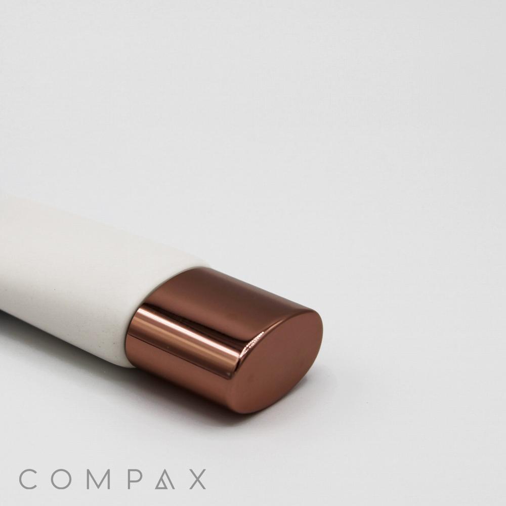 A sleek, cylindrical object with a white body and a metallic copper-colored cap. The words "25mm Oval Needle Nose" are visible at the bottom left corner against a plain white background.