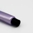 Close-up of a partially visible 16mm Screw Top purple tube with a black screw cap against a plain white background. The image focuses on the cap and the upper part of the tube.
