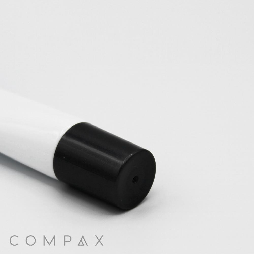 A close-up of a white cylindrical object with a black cap, likely a marker or pen, placed on a white surface. The word "19mm Needle Nose" is printed in gray in the bottom left corner of the image.