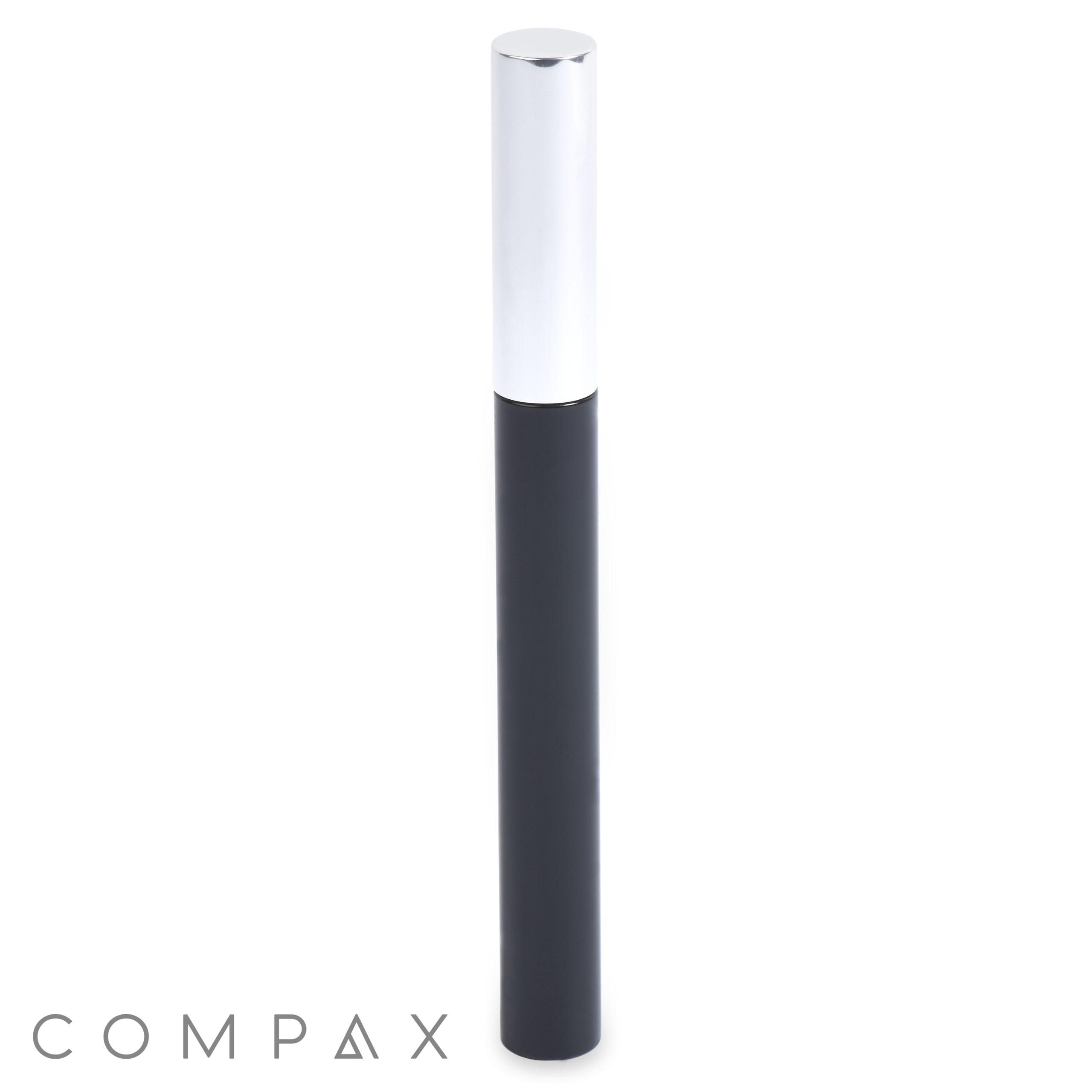 The Round Mascara Bottle, with its sleek cylindrical shape, shiny silver cap, and matte black body, stands upright against a white background.