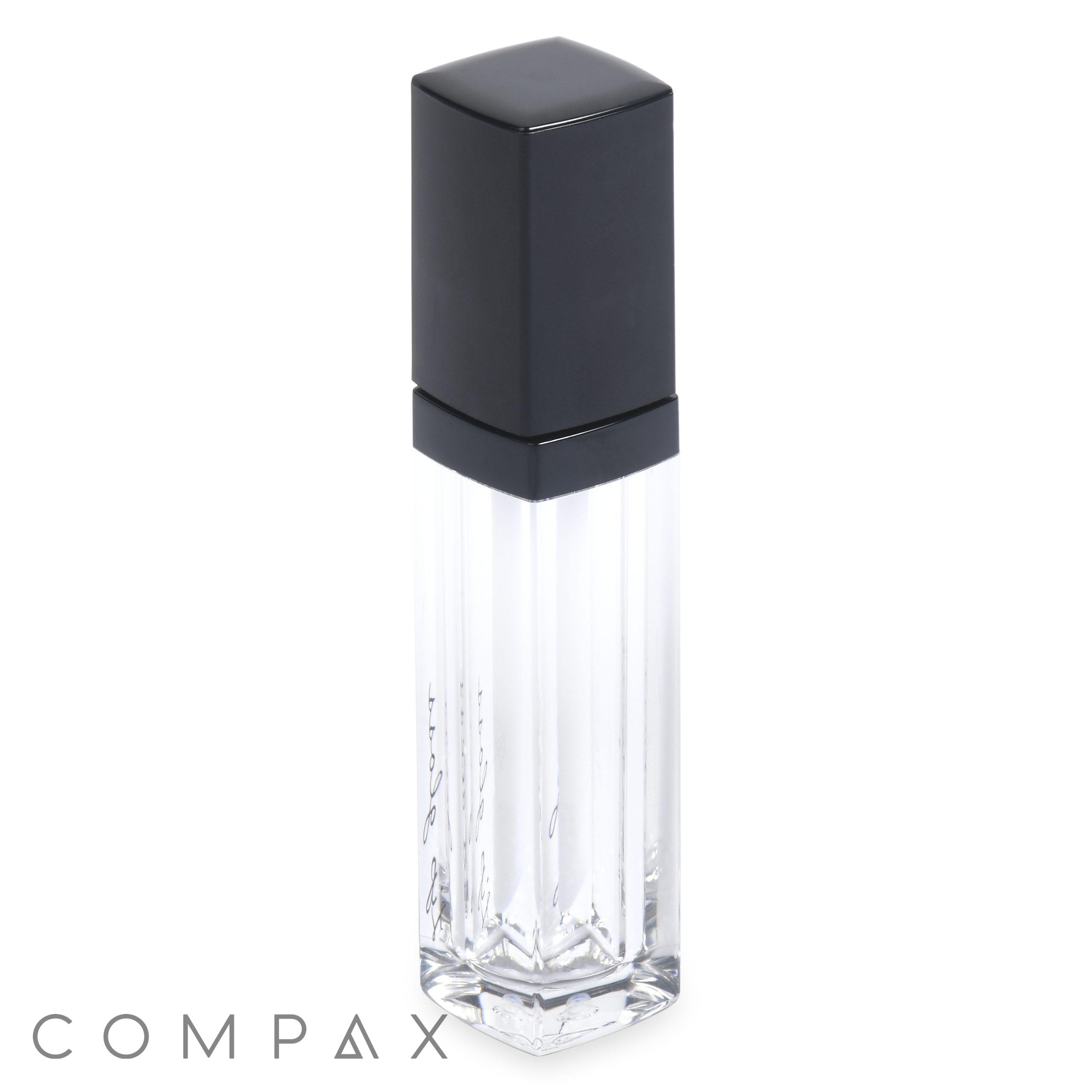 A clear glass Square Lip Gloss container with a black rectangular cap. The container features a sleek, vertical, ridged design and is empty. The cap fits snugly on top, giving the container a modern and elegant appearance. The Square Lip Gloss container is isolated on a white background.