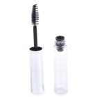 Open tube of the Round Mascara Bottle with a silver cap and a black bristle wand applicator. The applicator is resting on the side of the bottle, which stands upright to showcase its clear internal chamber designed to hold the mascara product. The background is white.