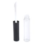 The Round Lip Gloss Bottle, featuring a clear tube and an opened black cap, stands upright beside its empty counterpart. The white applicator wand leans slightly to the left, revealing its gloss-covered tip.