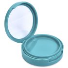 The Single Pan Round Compact is a teal, round compact mirror with a top lid that flips open to reveal the mirror inside. The circular base includes a compartment for holding small items, and both the mirror and the interior of the compartment are visible.