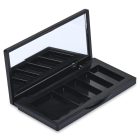 The 5 Well Rectangular Compact, a black, rectangular makeup palette, is shown open with multiple empty compartments. The inner lid features a built-in mirror reflecting part of the compact, and the compartments are designed to hold various makeup products such as eyeshadows or blushes.