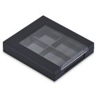 The 4 Well Square Compact is a sleek, minimalist black makeup palette case with a transparent top that reveals its four inner compartments. Its smooth edges and modern design make it an elegant accessory. The compact is showcased lying flat against a plain white background.