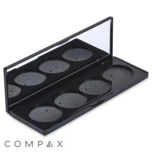A black makeup palette titled "4 Well Rectangular Compact with Mirror," featuring four shallow, rectangular compartments and a mirror on the inside of the lid, is open and empty. The unfilled compartments are displayed against a plain white background.