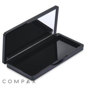 The Single Pan Rectangular Compact with Mirror features an open, empty black case with a mirror on the inside of the lid. This rectangular compact has rounded edges and boasts a glossy finish. It is designed to store makeup products like powder or eyeshadow.