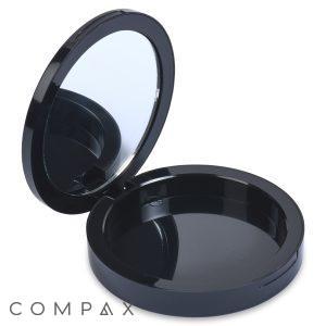 The Single Well Round Compact with Mirror is open, showcasing a round mirror on the top lid and an empty compartment below. This glossy and sleek black case is designed for portable use.