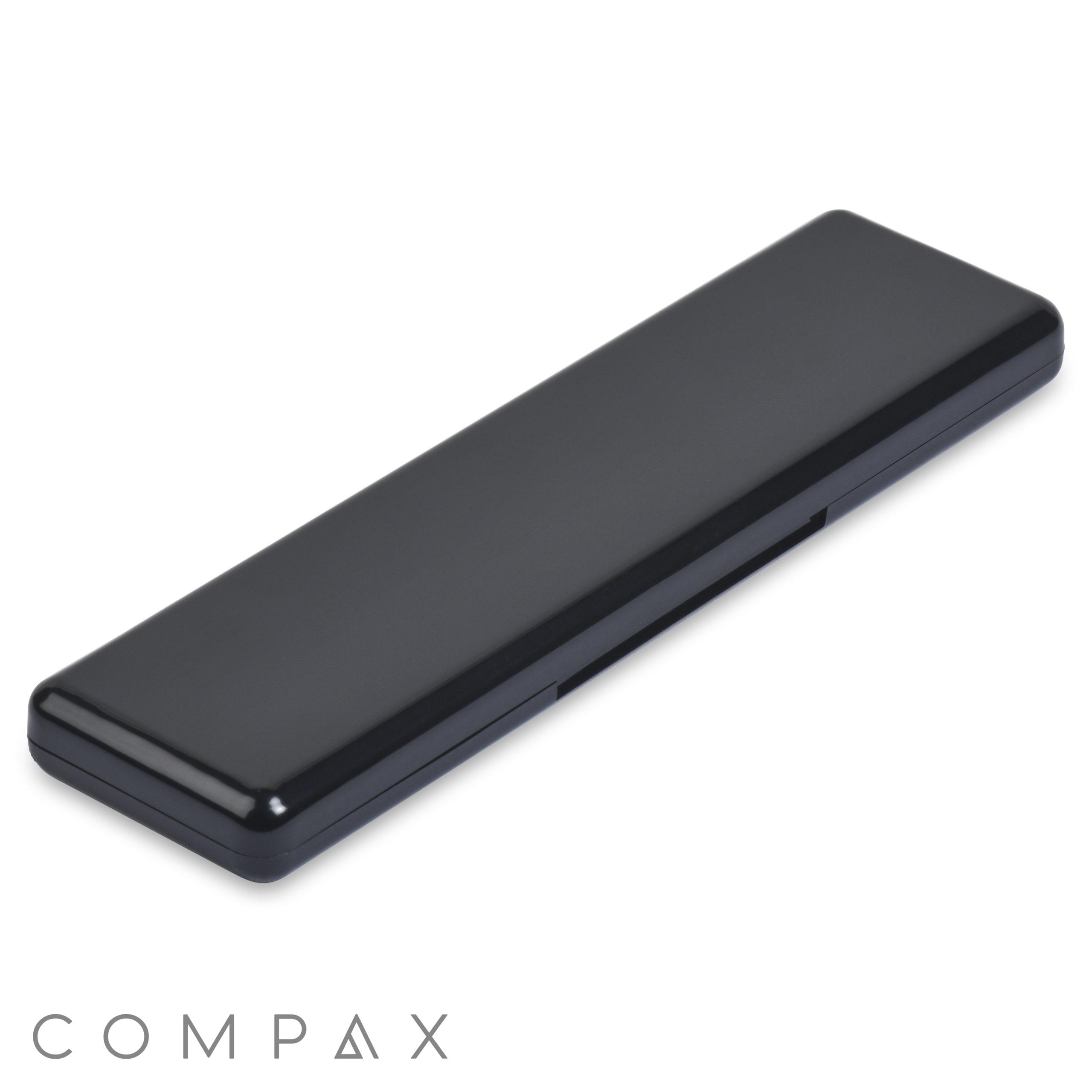 A sleek, black 5 Well Rectangular Compact with Mirror, featuring rounded edges and a smooth, glossy finish. The compact is closed and appears to be designed for storing items like cosmetics or small accessories.