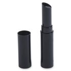 The Round Lipstick, featuring a sleek and modern design, showcases its lighter-colored lipstick inside a black cylinder-shaped case with the cap removed. The cylindrical cap, standing upright next to the open product, complements the overall aesthetic.