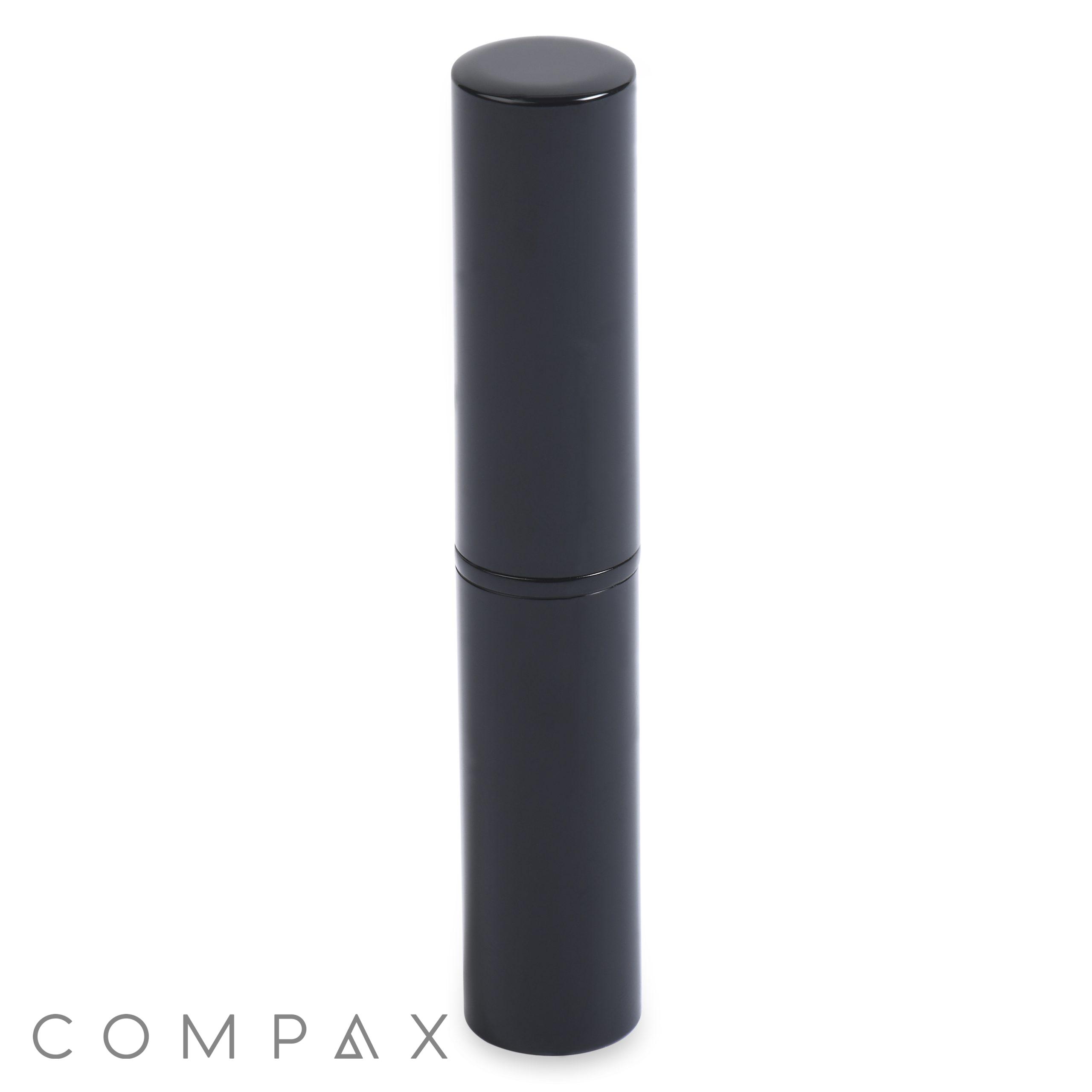 A sleek, cylindrical, dark-colored container of Round Lipstick stands upright against a plain white background. The minimalist design features a smooth surface and a tightly-fitted cap.