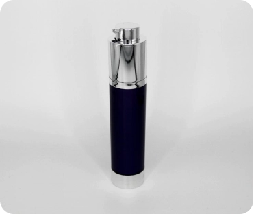 A sleek cylindrical airless pump bottle with a metallic top and a black body, designed for dispensing liquid products such as lotion or serum. The bottle stands upright against a plain white background.