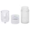 A clear airless pump bottle with the cap and clear pump dispenser top removed and placed beside it.