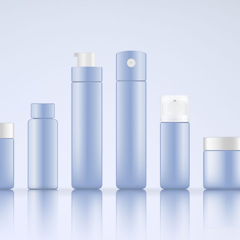 A row of six pastel blue cosmetic containers, varying in shape and size, with white caps. The containers include jars, spray bottles, a pump bottle, and a squeeze bottle, all aligned on a reflective surface against a light blue background.
