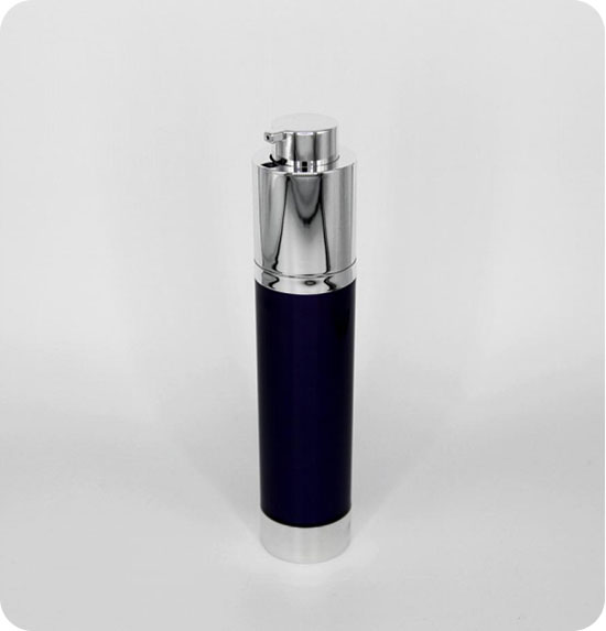 A sleek, cylindrical bottle with a shiny silver pump dispenser and dark navy blue body, standing upright against a plain white background.